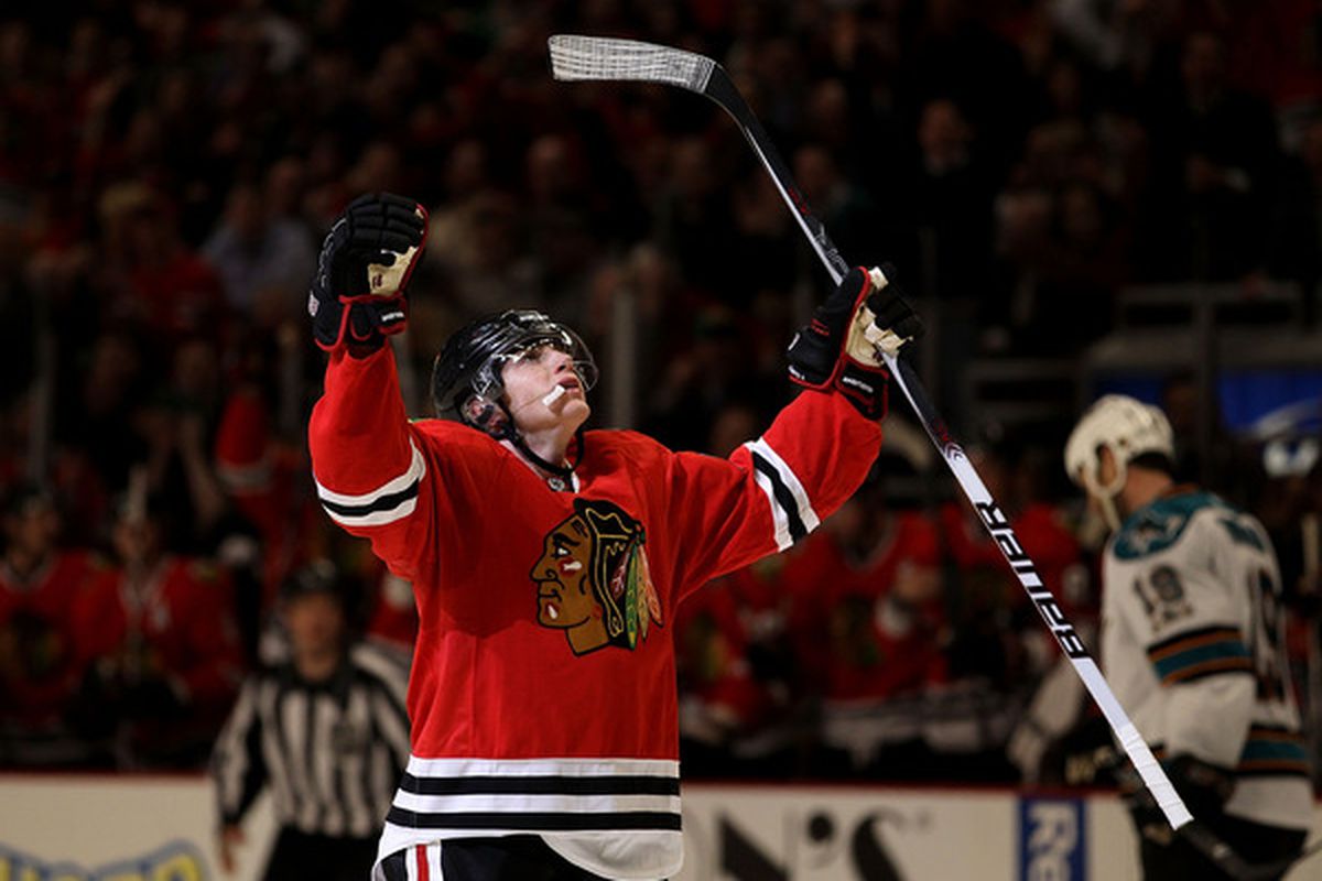 Patrick Kane of the Chicago Blackhawks celebrates the one hundredth goal of his career in the 2nd period against the San Jose Sharks at the United Center on March 14, 2011 in Chicago, Illinois. (Photo by Jonathan Daniel/Getty Images)
