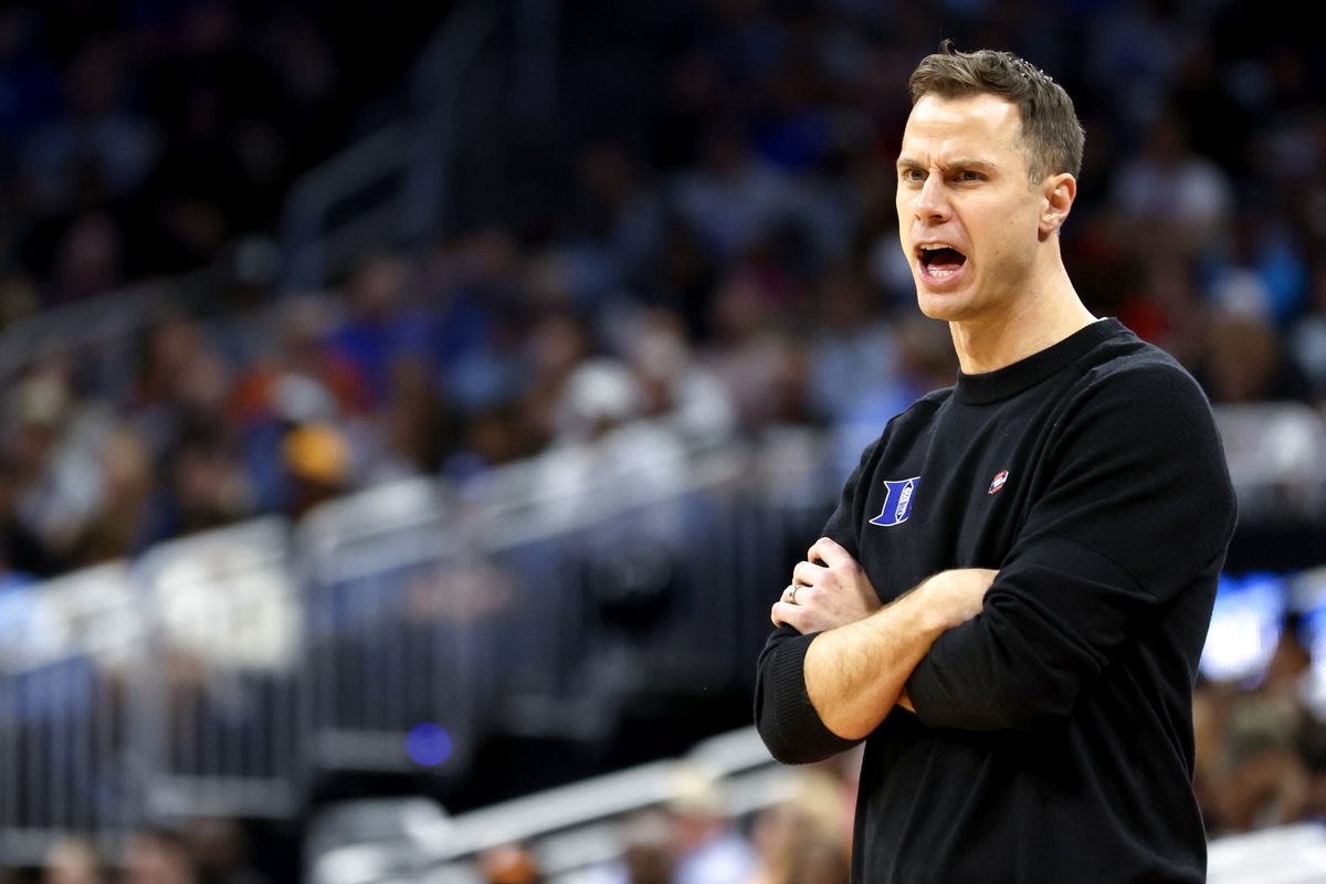 Head coach Jon Scheyer of the Duke Blue Devils looks on against the Tennessee Volunteers during the first half in the second round of the NCAA Men’s Basketball Tournament at Amway Center on March 18, 2023 in Orlando, Florida.