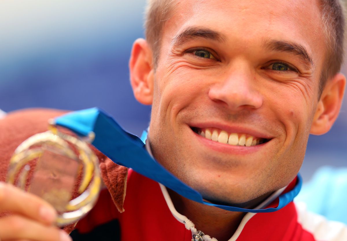 Nick Symmonds shows off his silver medal in the 800m