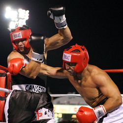 Vai Sikahema defeats Jose Canseco in a boxing match.