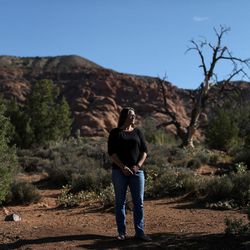 Molly McClish poses for a photo in an area where she and her daughter, Lily, used to ride horses in Moab on Friday, Sept. 29, 2017. McClish hopes to install a memorial in the area for Lily, who killed herself in January.