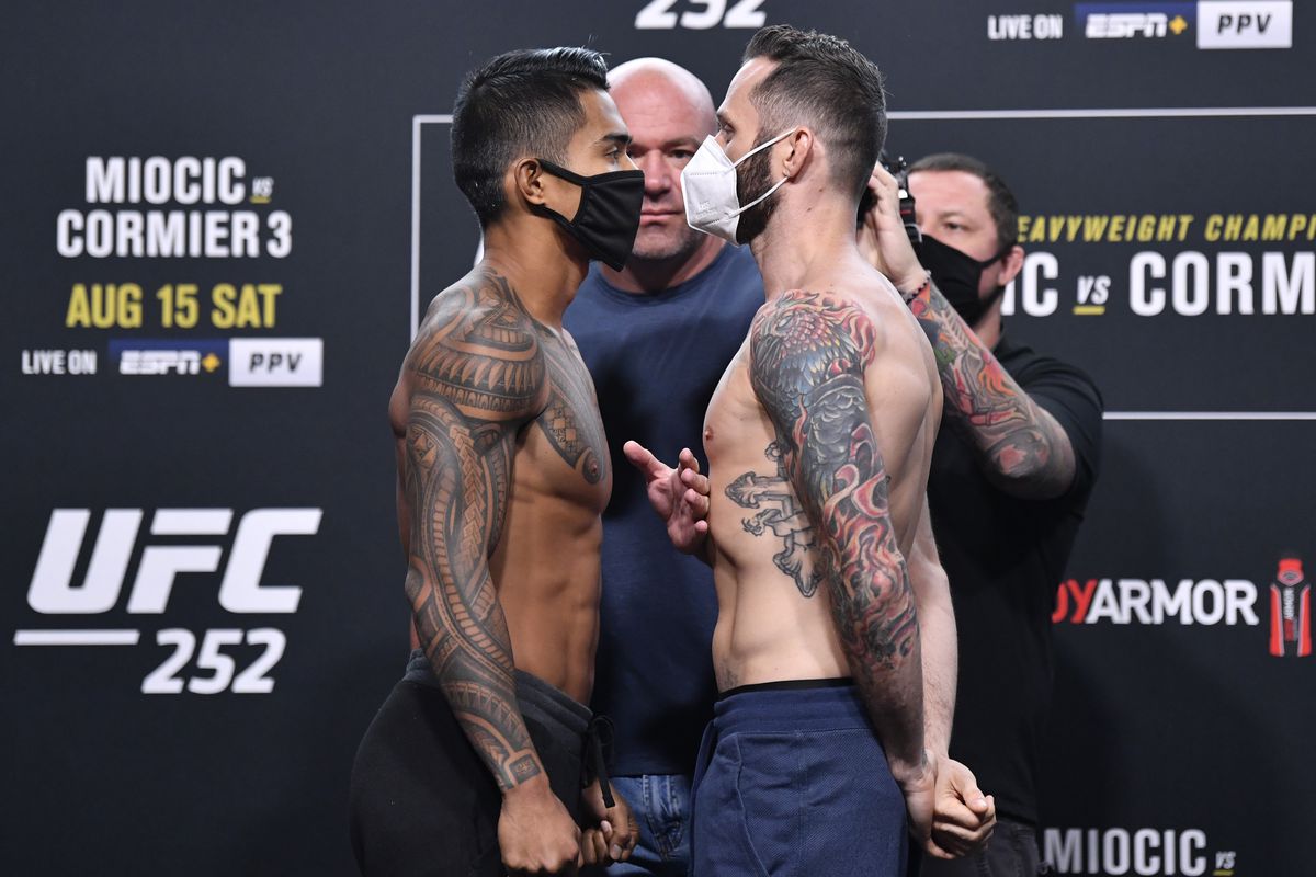 Opponents Kai Kamaka and Tony Kelley face off during the UFC 252 weigh-in at UFC APEX on August 14, 2020 in Las Vegas, Nevada.