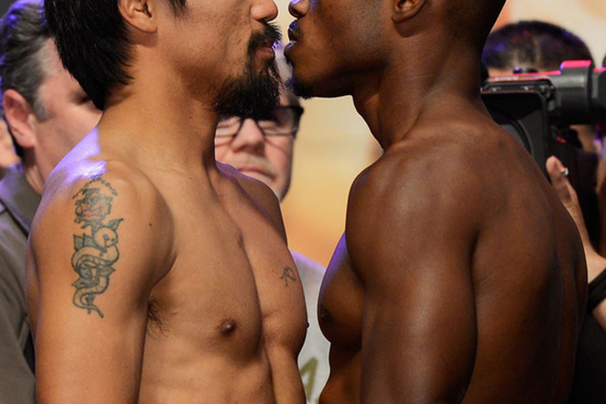Manny Pacquiao and Timothy Bradley are done talking. Tonight they fight. (Photo by Kevork Djansezian/Getty Images)