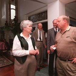 Larry H. MIller and his wife, Gail, discuss what extra food they need at a 50th wedding anniversary party for Miller's parents Sunday, June 7, 1998 at the same time Game 3 of the NBA Finals is going on in Chicago.