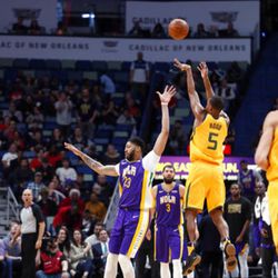 Utah Jazz guard Rodney Hood (5) shoots a 3-point shot at the buzzer to end the first half of an NBA basketball game in New Orleans, Monday, Feb. 5, 2018. (AP Photo/Gerald Herbert)