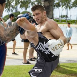 Brent Primus works out on Waikiki Beach.