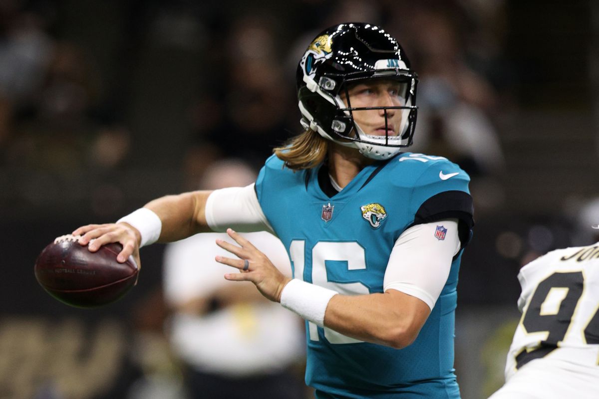 Trevor Lawrence #16 of the Jacksonville Jaguars looks to throw a pass against the New Orleans Saints at Caesars Superdome on August 23, 2021 in New Orleans, Louisiana.