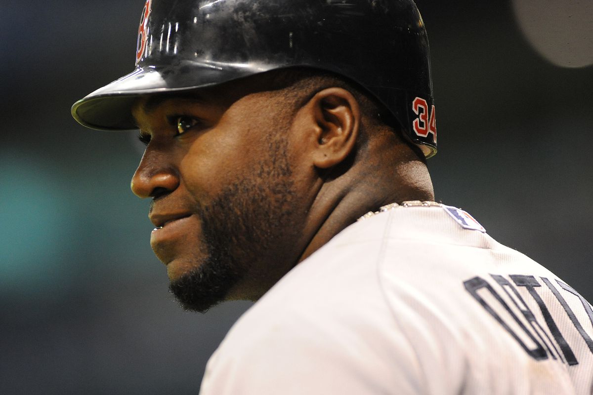 David Ortiz is smiling, because the new CBA is making it even easier for him to get paid by Boston. (Photo by Al Messerschmidt/Getty Images)