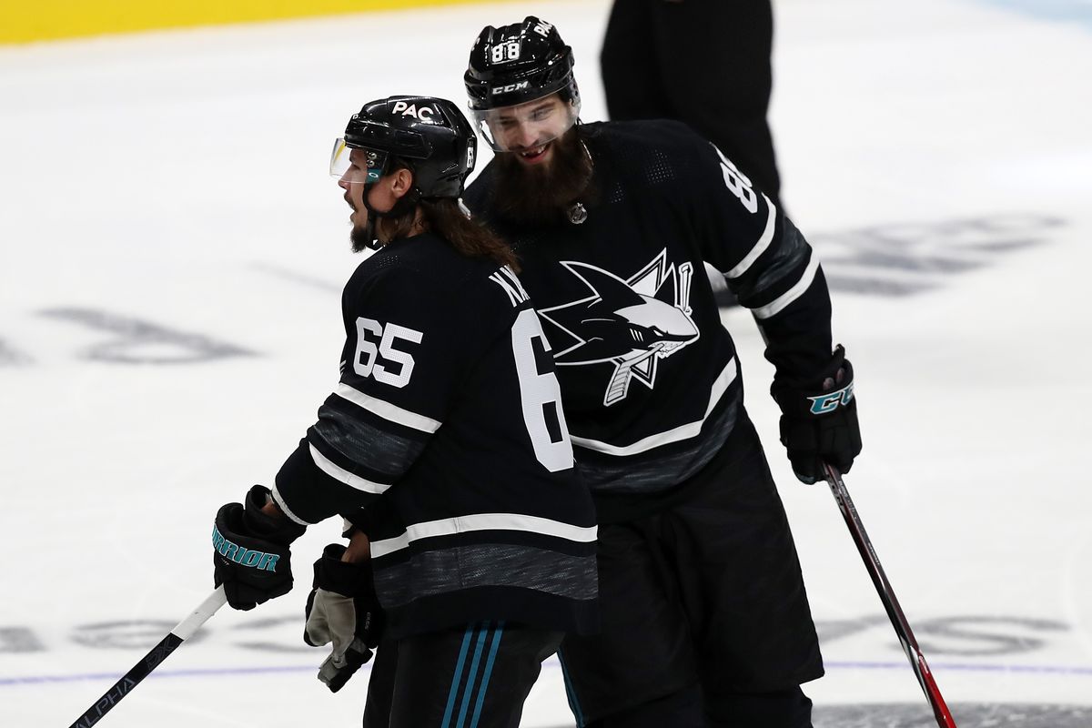 SAN JOSE, CA - JANUARY 26: Erik Karlsson #65 and Brent Burns #88 of the San Jose Sharks react to a goal during the 2019 Honda NHL All-Star Game at SAP Center on January 26, 2019 in San Jose, California.
