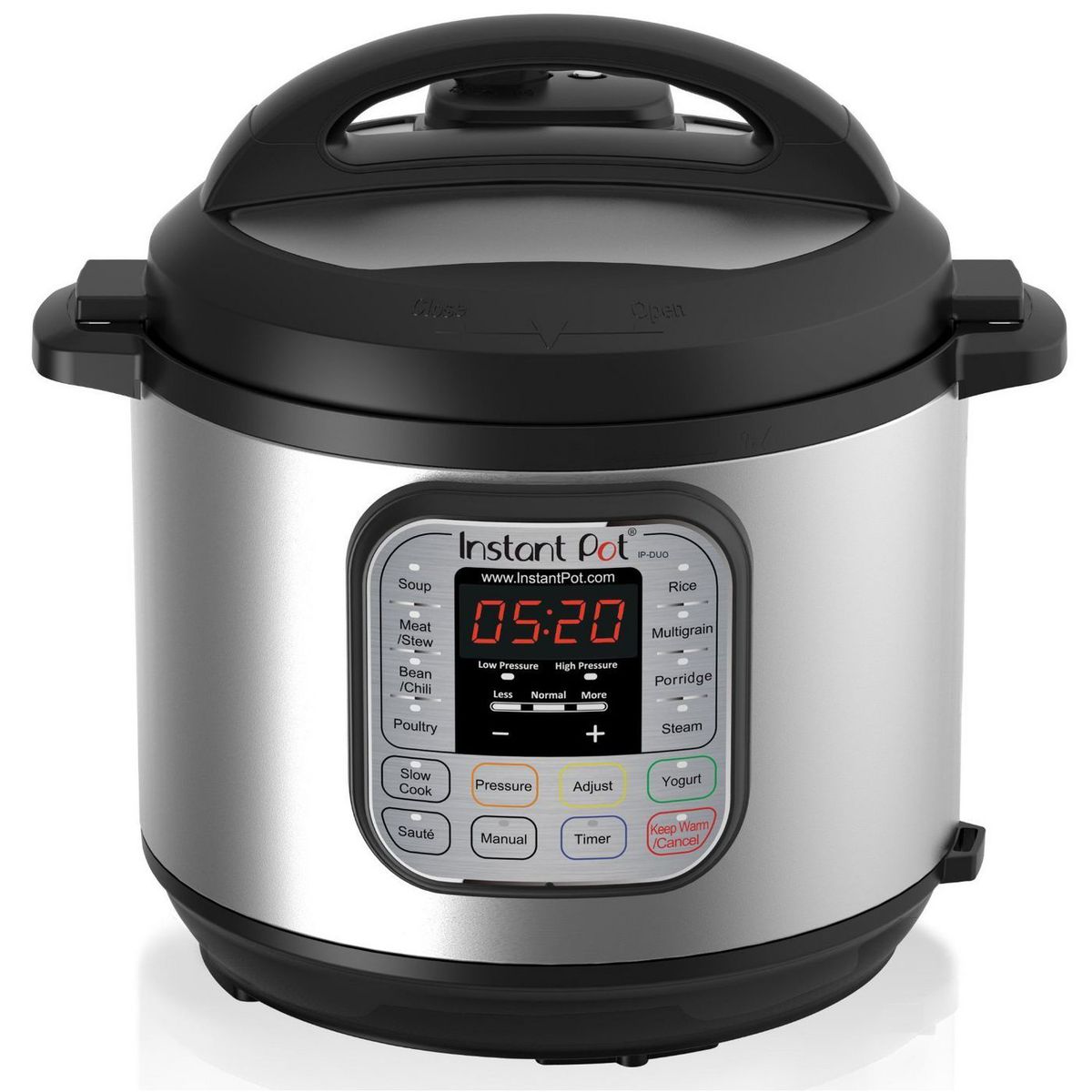 A chrome pressure cooker with a black lid.