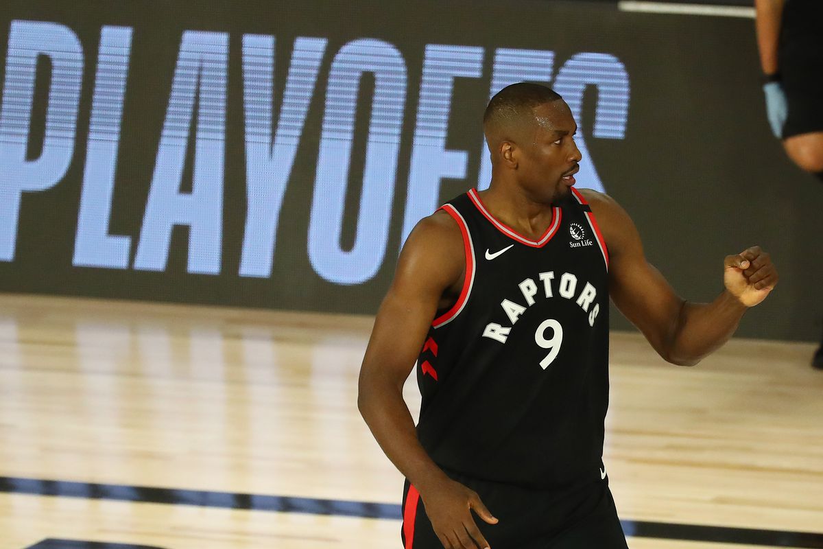 Toronto Raptors center Serge Ibaka celebrates after making a three pointer against the Boston Celtics in the first half in game six of the second round of the 2020 NBA Playoffs at ESPN Wide World of Sports Complex.