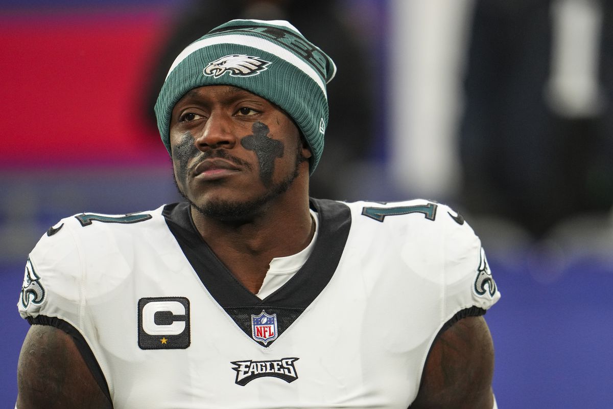 A.J. Brown of the Philadelphia Eagles looks on from the sideline prior to an NFL football game against the New York Giants at MetLife Stadium on January 7, 2024 in East Rutherford, New Jersey.