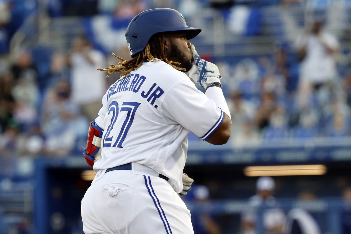 Toronto Blue Jays designated hitter Vladimir Guerrero Jr. (27) gestures as he runs the bases after hitting a two-run home run during the first inning against the Los Angeles Angels at TD Ballpark.