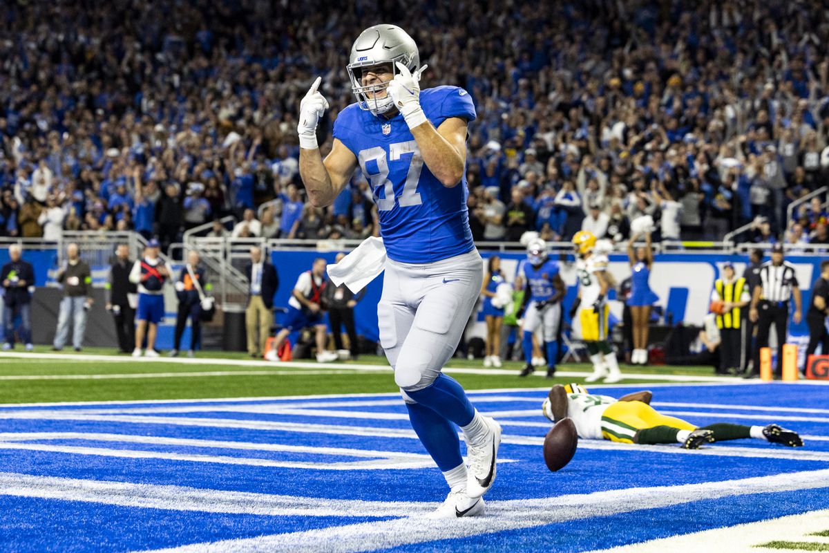 Sam LaPorta #87 of the Detroit Lions celebrates after scoring a touchdown during the game against the Green Bay Packers at Ford Field on November 23, 2023 in Detroit, Michigan. The Packers beat the Lions 29-22.