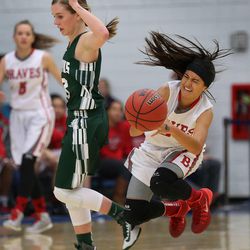 Bountiful's Amy Chidester is fouled by Olympus' Kyra Johnson as Bountiful High School defeats Olympus High School in the first round of the girls State 4A Tournament at Salt Lake Community College on Tuesday, Feb. 17, 2015, in Taylorsville.  
