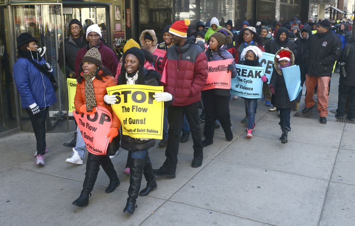 <small><strong>Protesters went up and down Michigan Avenue Wednesday to draw attention to the toll of gun violence in Chicago. | Michael Schmidt/Sun-Times </strong></small>