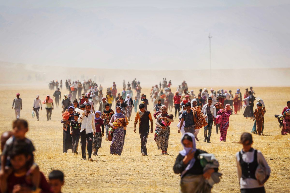 Thousands of Yezidis trapped in the Sinjar mountains as they tried to escape from Islamic State (IS) forces, are rescued by Kurdish Peshmerga forces and Peoples Protection Unit (YPG) in Mosul, Iraq on August 9, 2014.