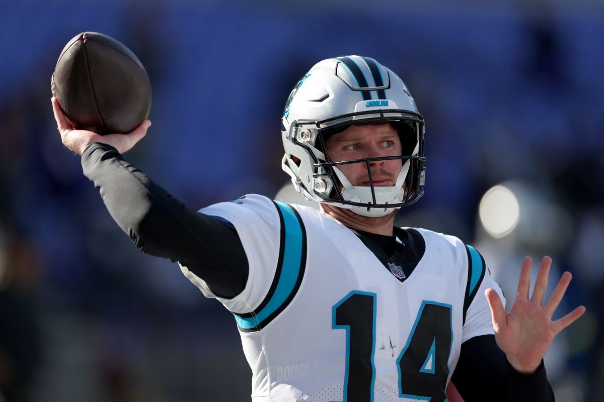 Quarterback Sam Darnold #14 of the Carolina Panthers warms up against the Baltimore Ravens at M&amp;T Bank Stadium on November 20, 2022 in Baltimore, Maryland.