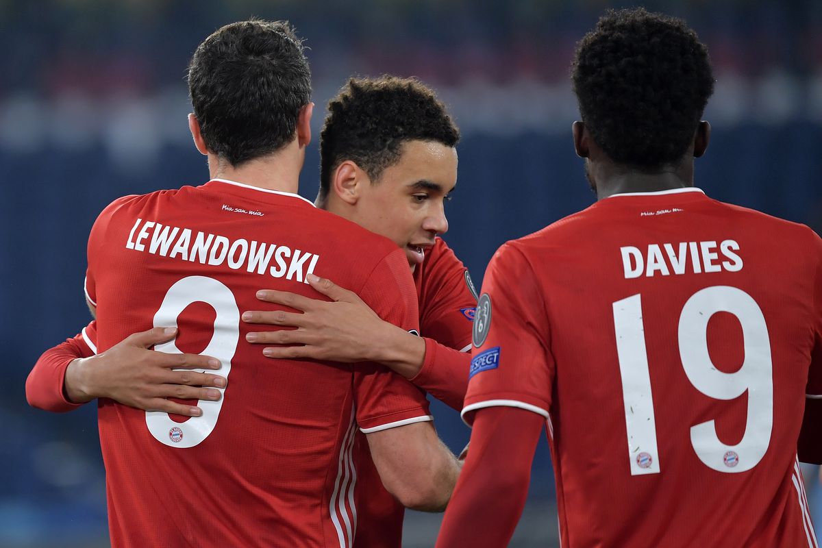 Robert Lewandowski of FC Bayern Munchen celebrates with...