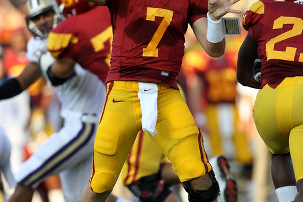 LOS ANGELES - OCTOBER 2:  Quarterback Matt Barkley #7 of the USC Trojans throws a pass against the Washington Huskies at the Los Angeles Memorial Coliseum on October 2 2010 in Los Angeles California.    (Photo by Stephen Dunn/Getty Images)