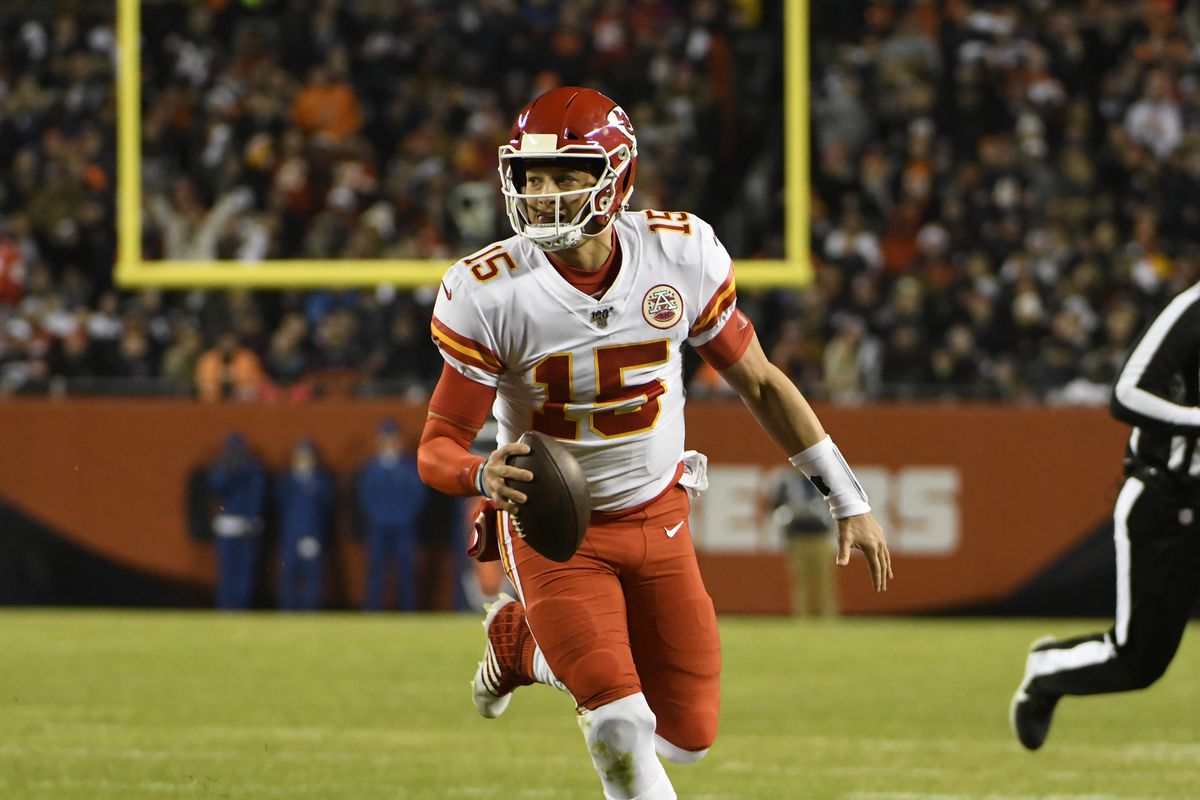 Kansas City Chiefs quarterback Patrick Mahomes runs for a touchdown against the Chicago Bears during the first half at Soldier Field.