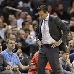 Utah Jazz head coach Quin Snyder walks down the court during the second half of an NBA basketball game against the Charlotte Hornets in Charlotte, N.C., Friday, Jan. 12, 2018. (AP Photo/Chuck Burton)