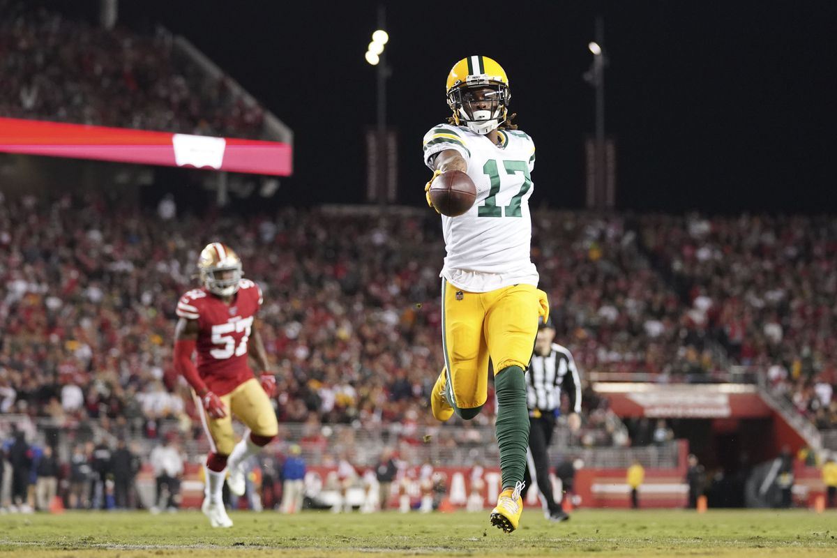 Green Bay Packers wide receiver Davante Adams scores a touchdown against San Francisco 49ers linebacker Dre Greenlaw during the third quarter at Levi’s Stadium.