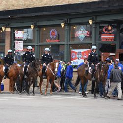 1:22 p.m. Mounted patrol unit in front of the Cubby Bear, to control the pedestrian crosswalk - 