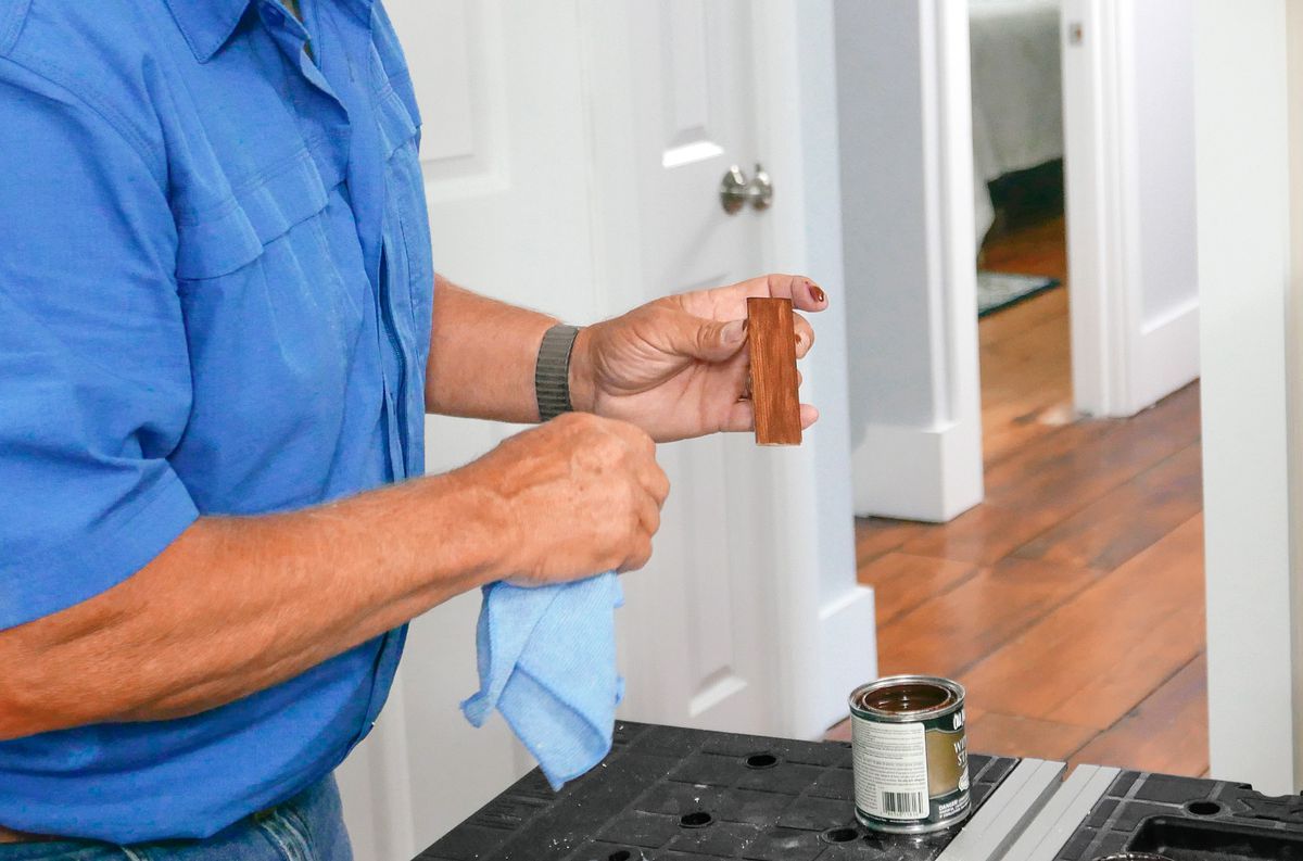 Man Stains Wood Patch