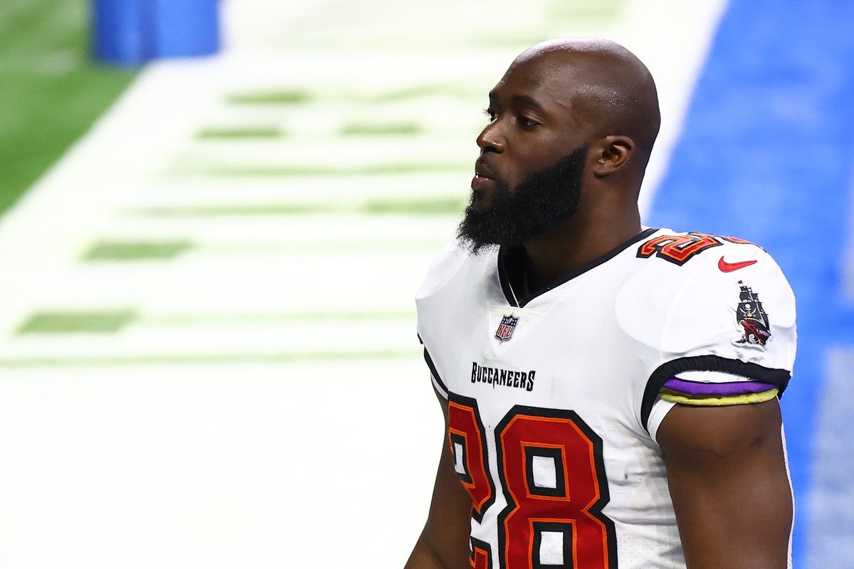 Leonard Fournette #28 of the Tampa Bay Buccaneers walks off the field up before a game a game against the Detroit Lions at Ford Field on December 26, 2020 in Detroit, Michigan.