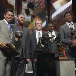 Florida State head coach Jimbo Fisher, center, poses with team members Roberto Aguayo, left, Bryan Stork, second from left, Lamarcus Joyner, second from right, and Jameis Winston after the College Football Awards show in Lake Buena Vista, Fla., Thursday, Dec. 12, 2013. 
