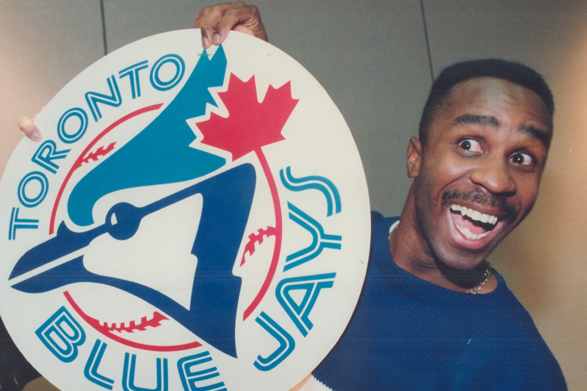 Blue Jays outfielder Devon White has good reason to be happy. He’s close to a $10 million; three-yea