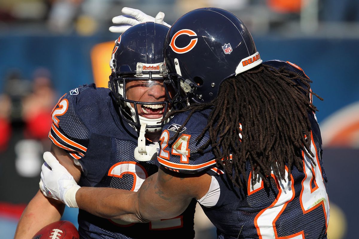 CHICAGO, IL - DECEMBER 18: Kahlil Bell #32 of the Chicago Bears celebrates a touchdown catch with Marion Barber #24 against the Seattle Seahawks at Soldier Field on December18, 2011 in Chicago, Illinois. (Photo by Jonathan Daniel/Getty Images)