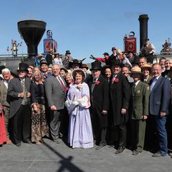 The historic photo of the meeting of the rails from May 10, 1869, is re-created during the 150th anniversary celebration at the Golden Spike National Historical Park in Promontory Summit on Friday, May 10, 2019.