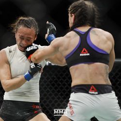Tecia Torres hits Michelle Waterson at UFC 218.