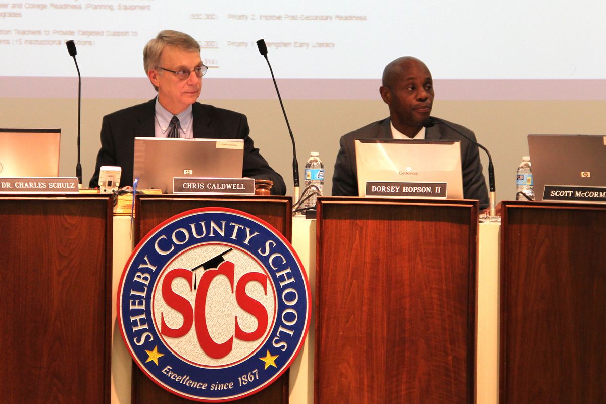 Board chairman Chris Caldwell and Superintendent Dorsey Hopson listen to a budget presentation in 2015.