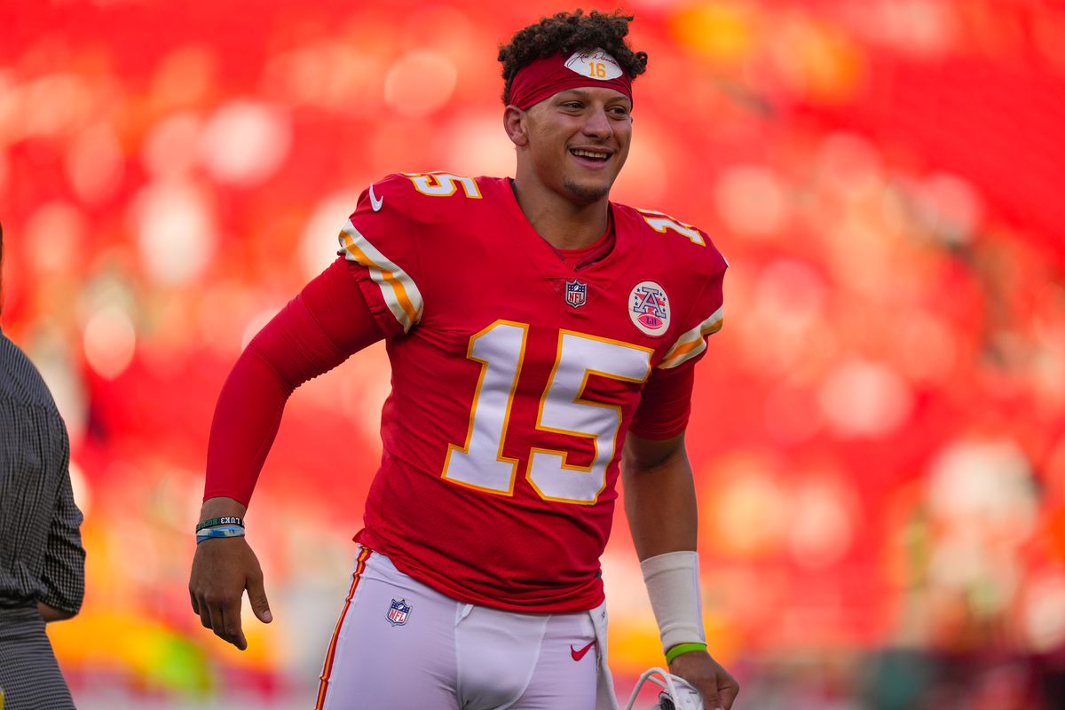 Patrick Mahomes #15 of the Kansas City Chiefs runs back to the sideline prior to the preseason game against the Green Bay Packers at Arrowhead Stadium on August 25, 2022 in Kansas City, Missouri.