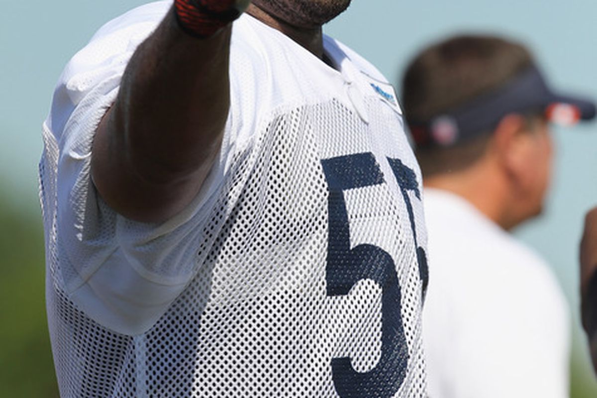 BOURBONNAIS, IL - JULY 30: Lance Briggs (Arizona) #55 of the Chicago Bears greets new teammates during a summer training camp practice at Olivet Nazarene University on July 30, 2011 in Bourbonnais, Illinois. (Photo by Jonathan Daniel/Getty Images)