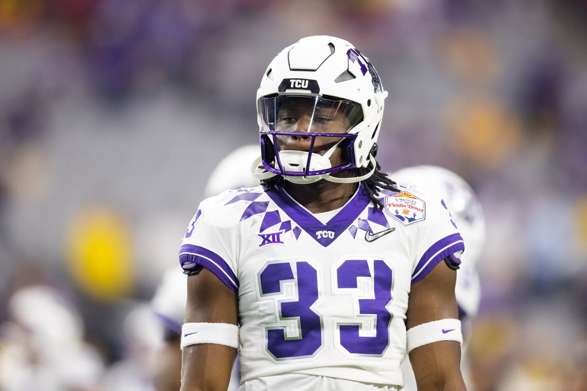 TCU Horned Frogs running back Kendre Miller against the Michigan Wolverines during the 2022 Fiesta Bowl at State Farm Stadium.
