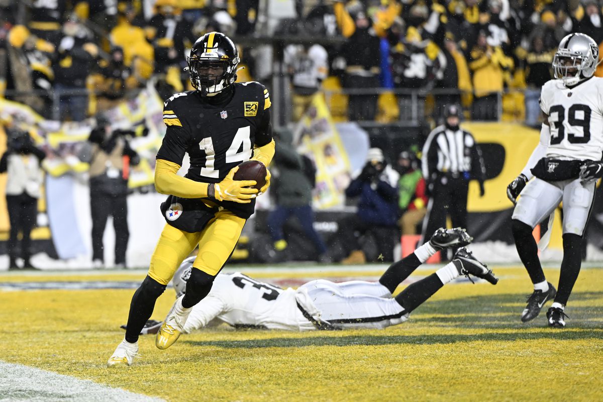 George Pickens #14 of the Pittsburgh Steelers scores a touchdown during the fourth quarter against the Las Vegas Raiders at Acrisure Stadium on December 24, 2022 in Pittsburgh, Pennsylvania.