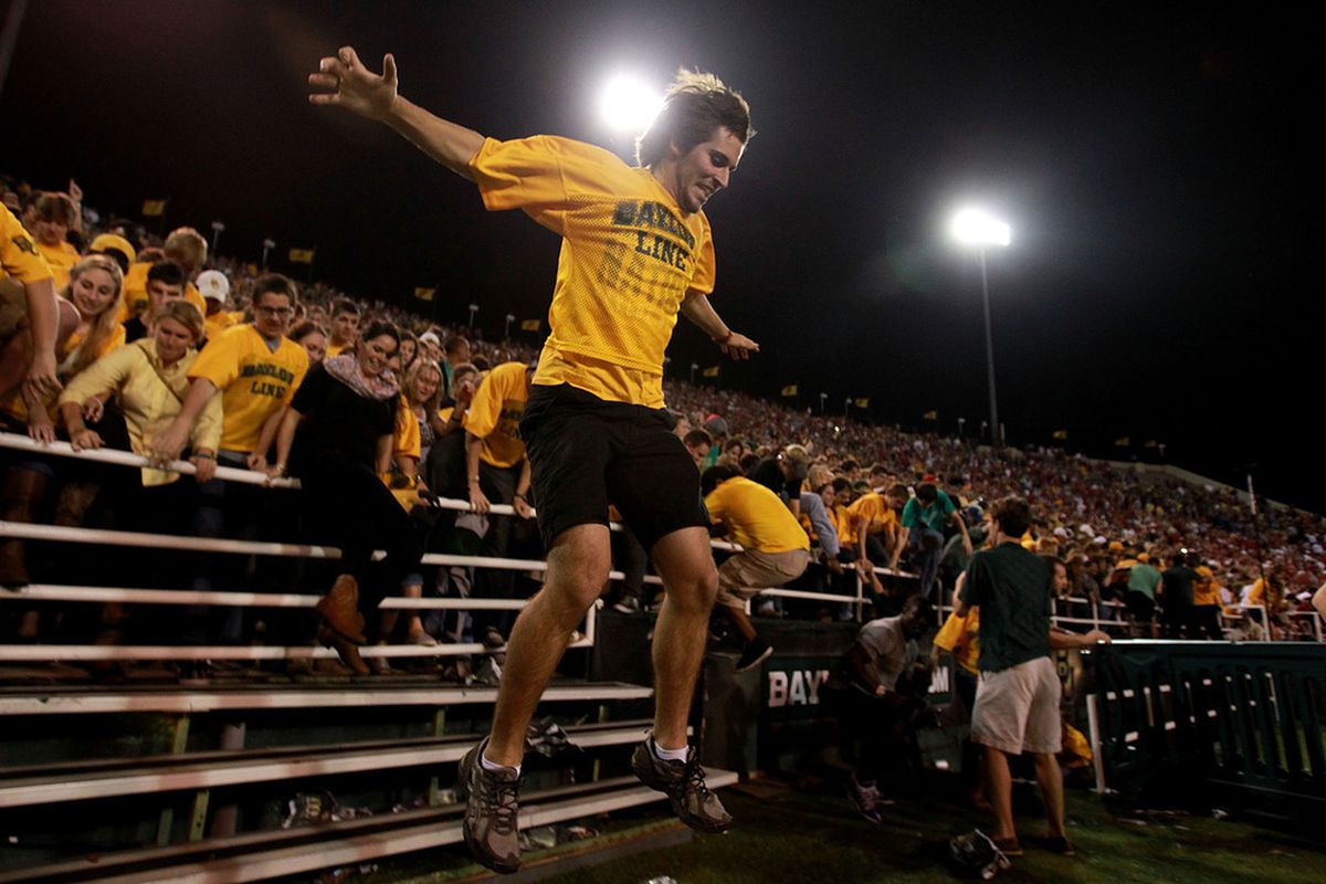 WACO, TX - NOVEMBER 19:  Baylor Bears students rush the field after a 48-35 win against the Oklahoma Sooners at Floyd Casey Stadium on November 19, 2011 in Waco, Texas.  (Photo by Ronald Martinez/Getty Images)