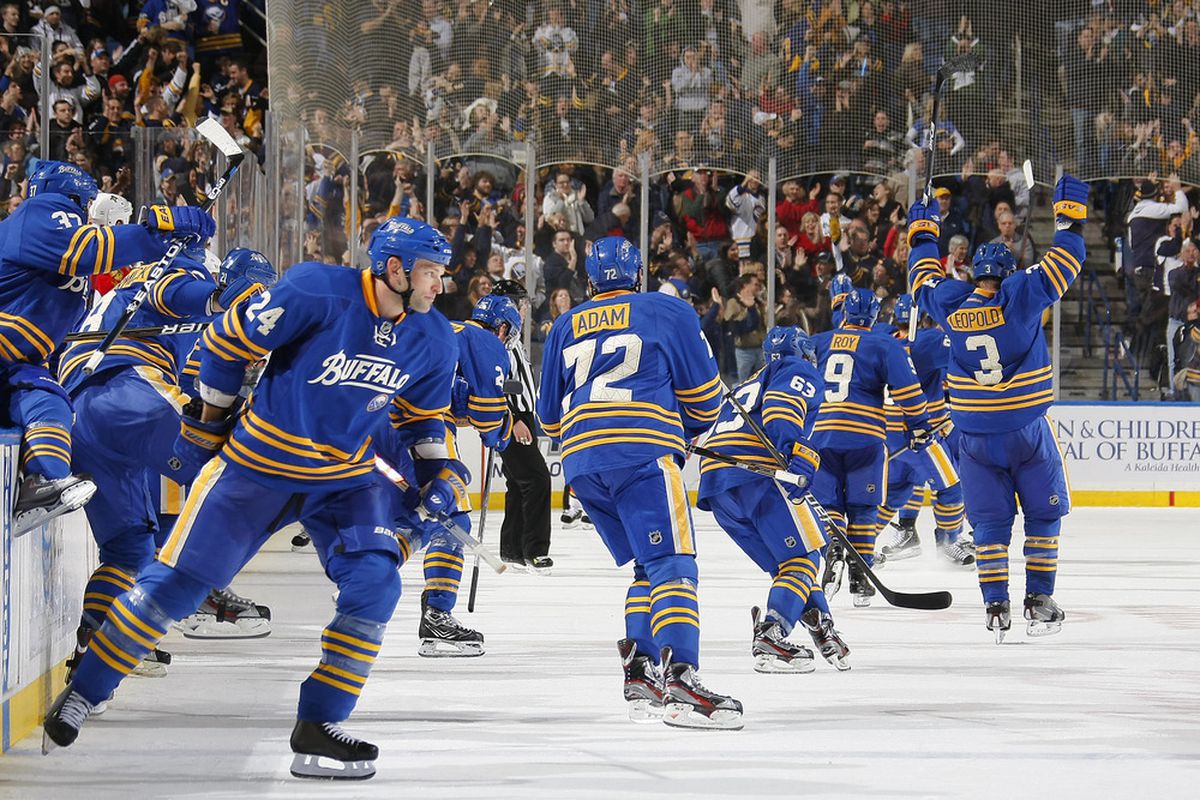 BUFFALO, NY - DECEMBER 9:  Members of the Buffalo Sabres celebrate their overtime win over the Florida Panthers during their NHL game at First Niagara Center on December 9, 2011 in Buffalo, New York.  (Photo by Dave Sandford Getty Images)