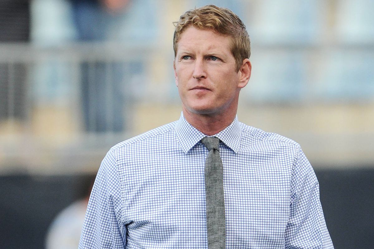 Interim manager Jim Curtin looks to the stands in search of a pair of pants that fit him.