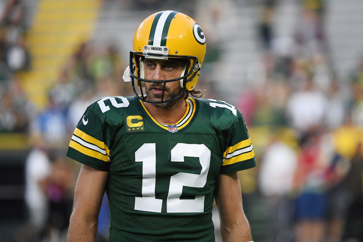 Aaron Rodgers #12 of the Green Bay Packers warms-up against the Detroit Lions at Lambeau Field on September 20, 2021 in Green Bay, Wisconsin.