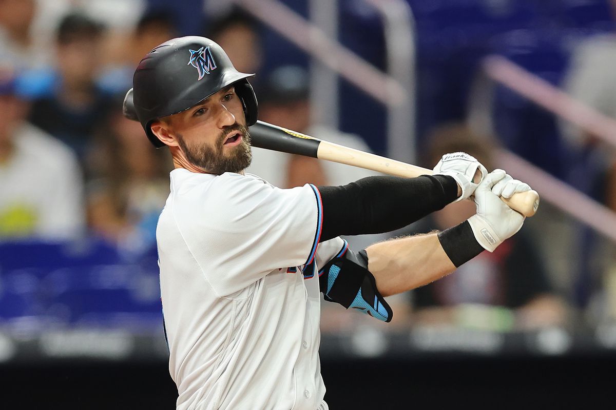Jon Berti #5 of the Miami Marlins hits a RBI single during the tenth inning against the Pittsburgh Pirates at loanDepot park on July 13, 2022 in Miami, Florida.