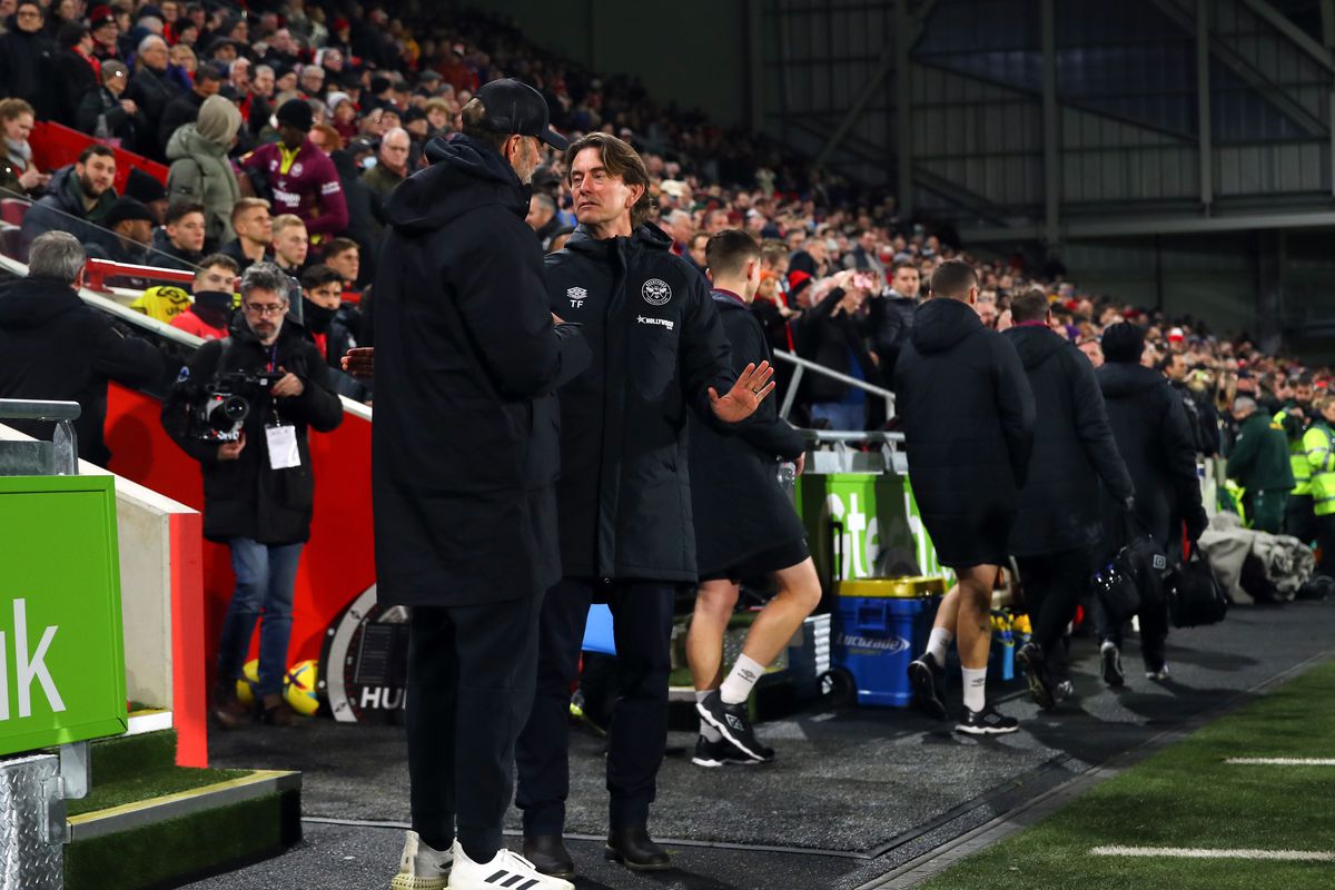 Jurgen Klopp manager of Liverpool with Brentford Manager Thomas Frank during the Premier League match between Brentford FC and Liverpool FC at Brentford Community Stadium on January 2, 2023 in Brentford, United Kingdom.