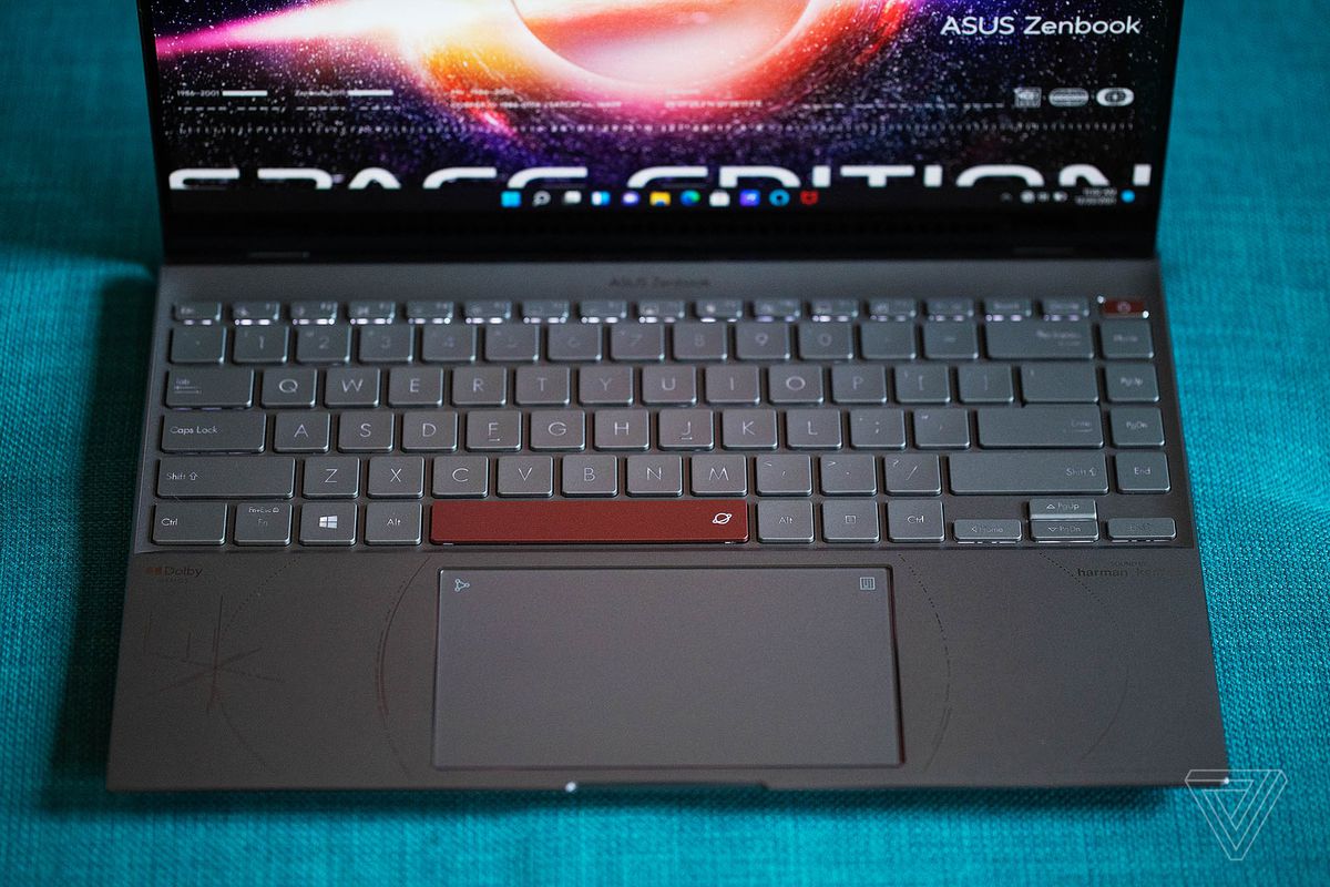 Top view of the Asus Zenbook 14 OLED Space Edition keyboard.  The screen displays the words Space Edition.