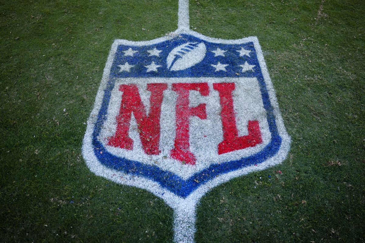 A general view of an NFL logo on the field during the game between the Washington Commanders and the Tennessee Titans at FedExField on October 9, 2022 in Landover, Maryland.