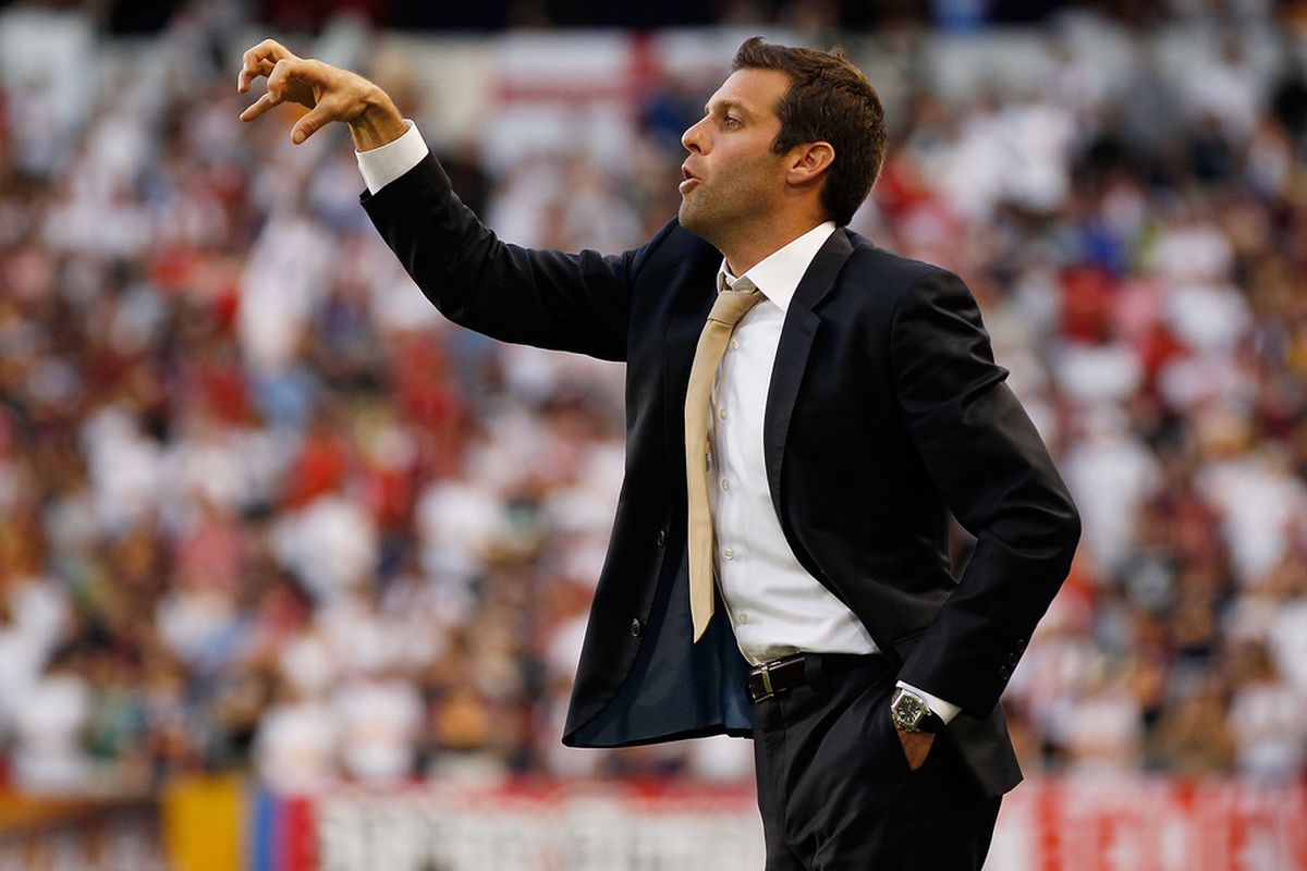 HARRISON, NJ - JULY 09:  Head Coach Ben Olsen of D.C. United directs from the bench during the game against the New York Red Bulls on July 9, 2011 at Red Bull Arena in Harrison, New Jersey.  (Photo by Mike Stobe/Getty Images for New York Red Bulls)