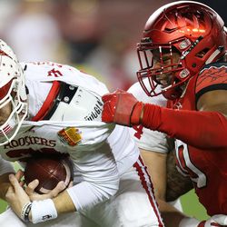 Indiana Hoosiers quarterback Richard Lagow (21) is sacked by Utah Utes defensive end Pita Taumoepenu (50) as the Utes and the Hoosiers play in the Foster Farms Bowl in Santa Clara, California, on Wednesday, Dec. 28, 2016.